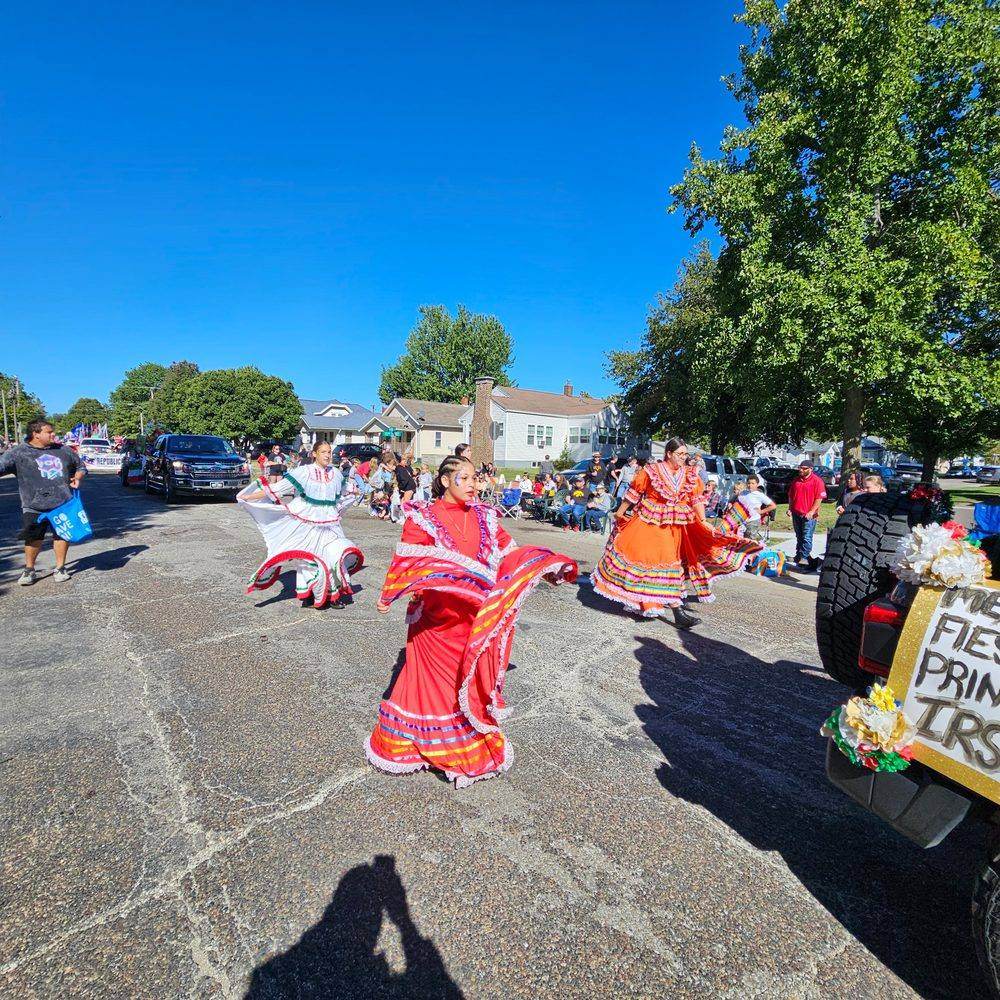 La Fiesta Dance Troupe dancers in traditional dress at the street parade
