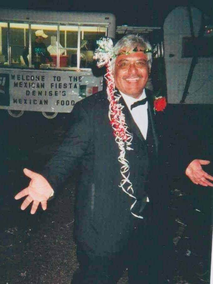 Archival photo of a past Fiesta king in formal attire