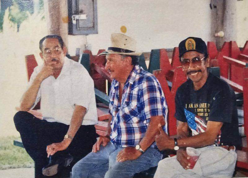 Archival photo of three men at the Fiesta